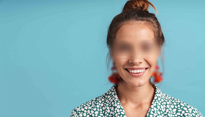Woman with blurred eyes to protect her identity