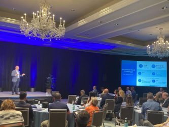 Nicos Vekiarides presenting at 2022 Guidewire Symposium